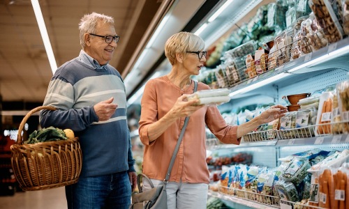 Find your perfect fit at 610 West a man and woman grocery shopping