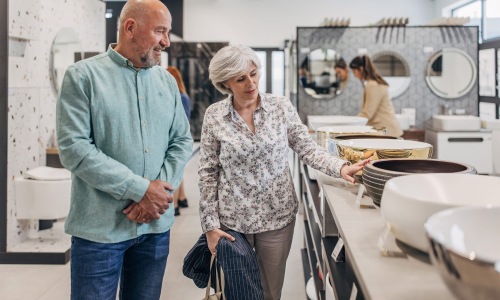 A beautiful community at the heart of all your passions a man and woman shopping for dishes