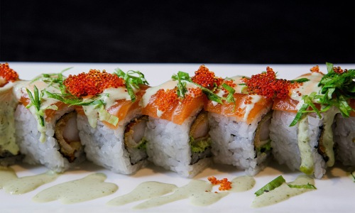 Bustling community with plenty of dining choices a plate of sushi