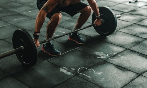 Find your perfect fit a man lifting weights
