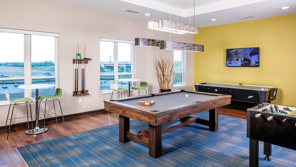 Game room with pool, air hockey and foosball